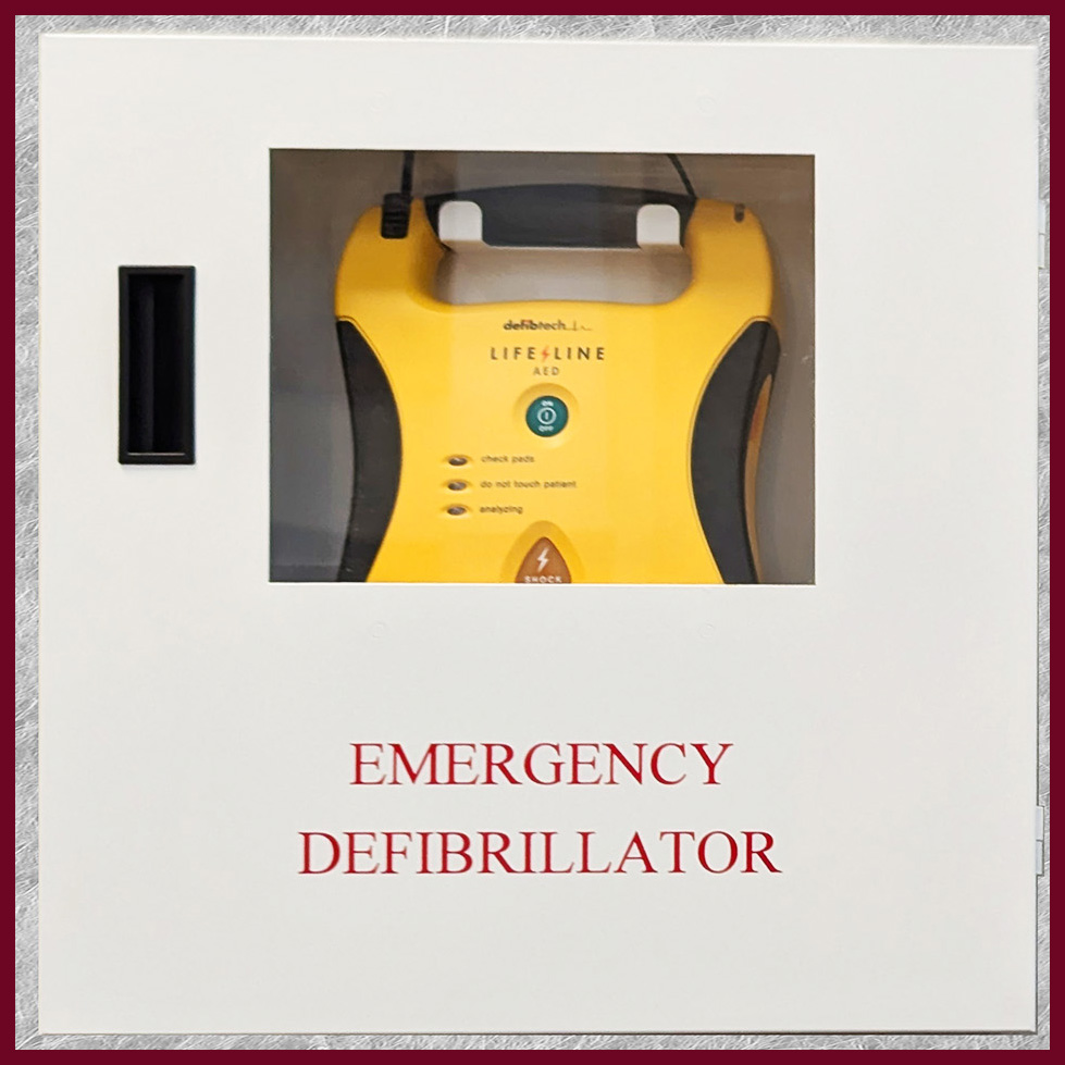 Emergency Defibrillator in easily accessible case on wall of Chatham County building