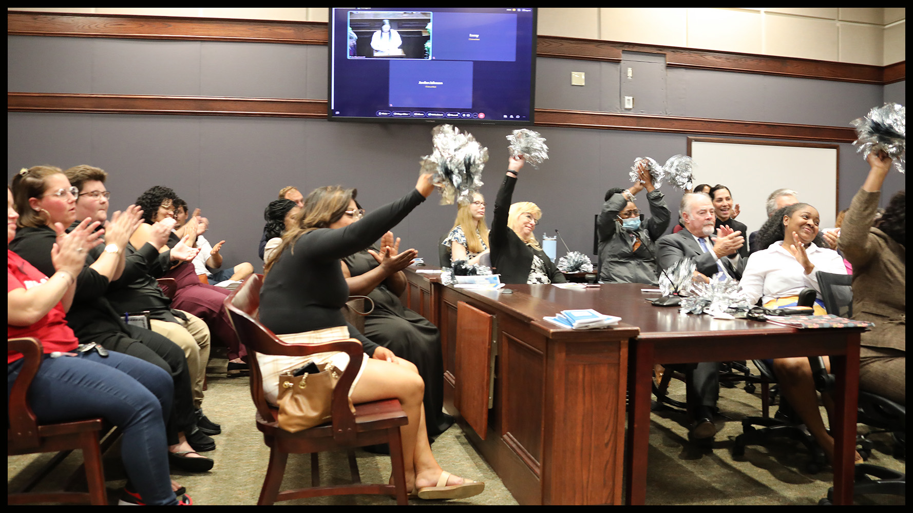 Participants and team members at an Anchor Court graduation ceremony.